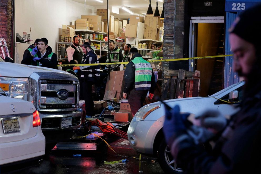 PHOTO: FILE - In this Dec. 11, 2019, file photo, emergency responders work at a kosher supermarket, the site of a fatal shooting in Jersey City, N.J. Jersey City. 