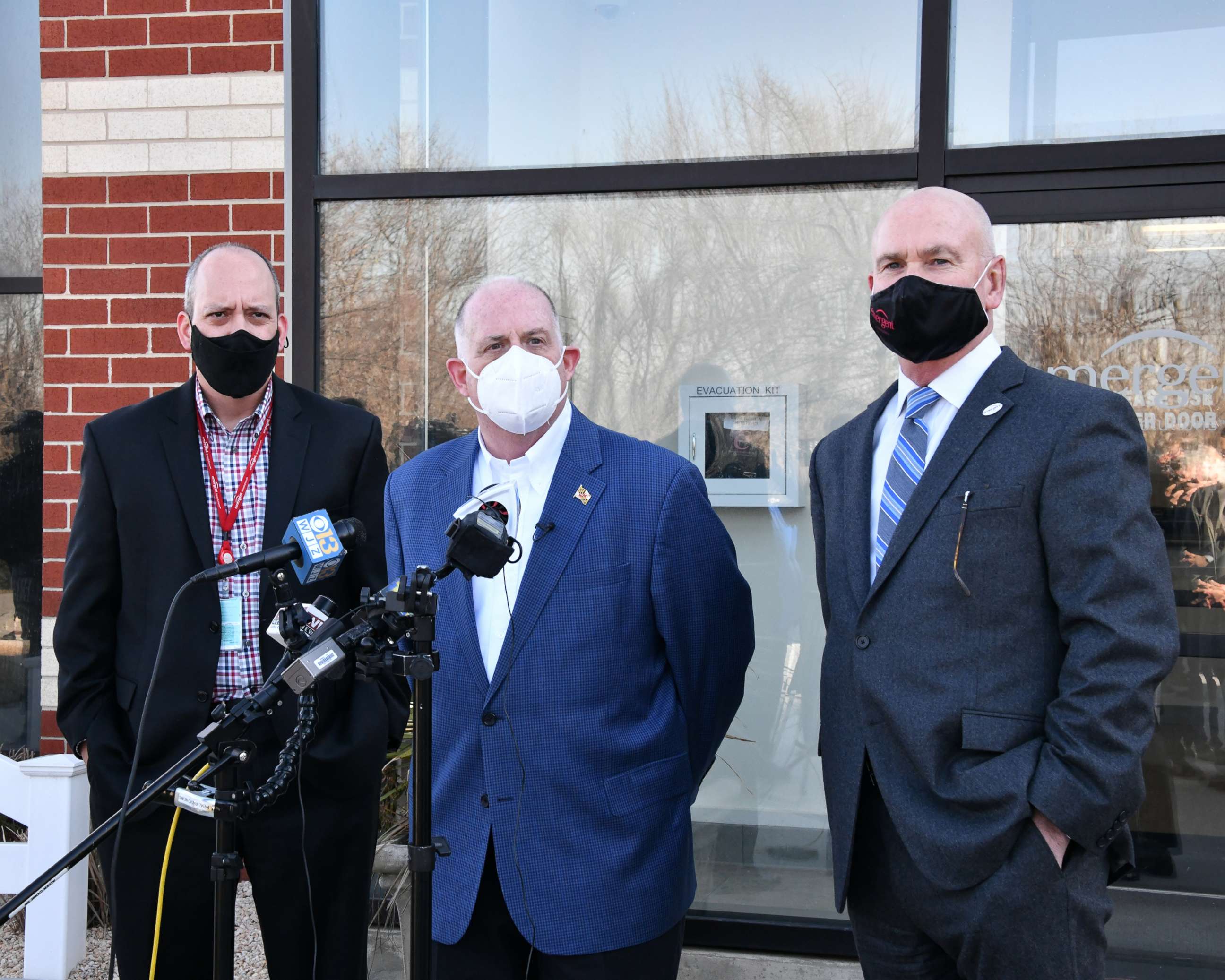 PHOTO: Maryland Governor Larry Hogan, left, holds a press conference with Emergent BioSolutions CEO Robert Kramer, right, at the company's plant in Baltimore, Feb. 8, 2021.