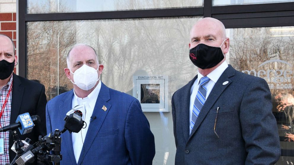 PHOTO: Maryland Governor Larry Hogan, left, holds a press conference with Emergent BioSolutions CEO Robert Kramer, right, at the company's plant in Baltimore, Feb. 8, 2021.