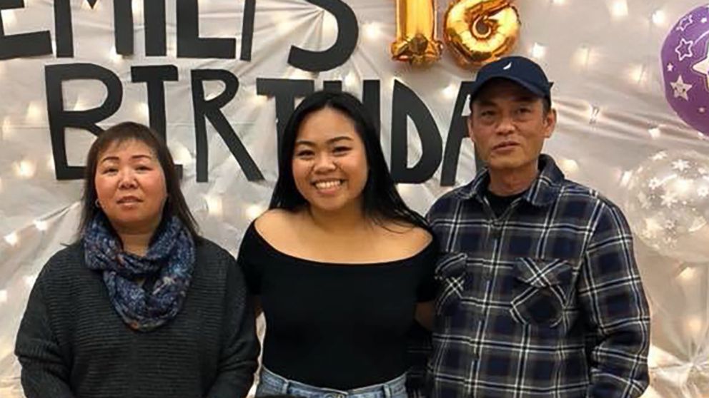 Emily Huynh is pictured with her parents and younger brother in an undated handout photo.