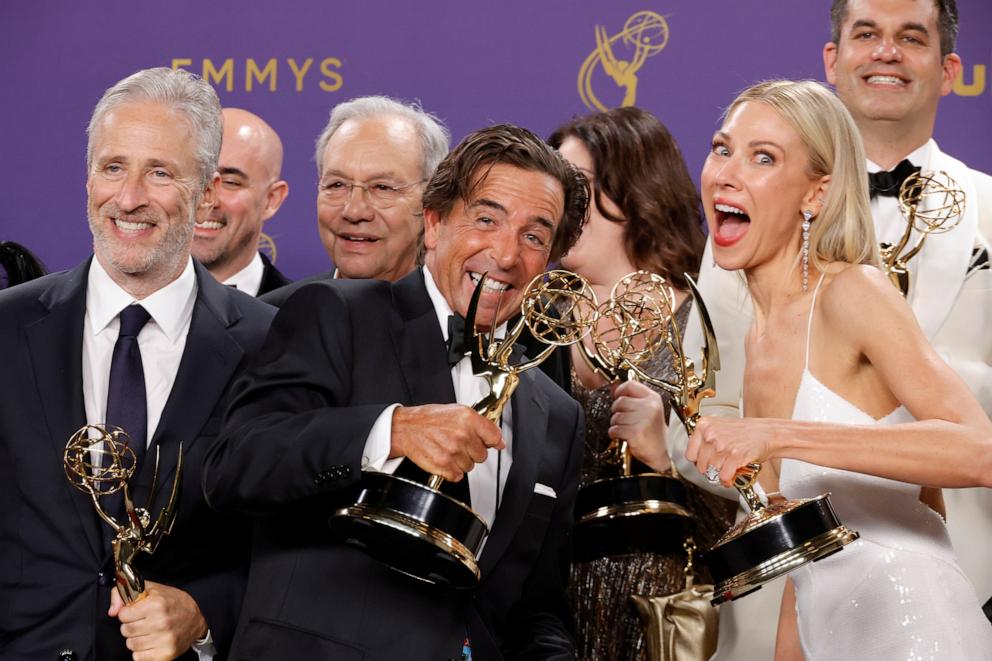 PHOTO: Jon Stewart and the Cast and Crew of "The Daily Show" pose in the press room after winning the Outstanding Talk Series Award during the 76th Primetime Emmy Awards, September 15, 2024, in Los Angeles.