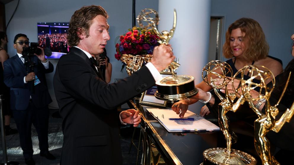 PHOTO: Jeremy Allen White picks up his official engraved Emmy statuette for outstanding lead actor in a comedy series for "The Bear" at the 76th Emmy Awards Trophy Table, Sept. 15, 2024, in Los Angeles.