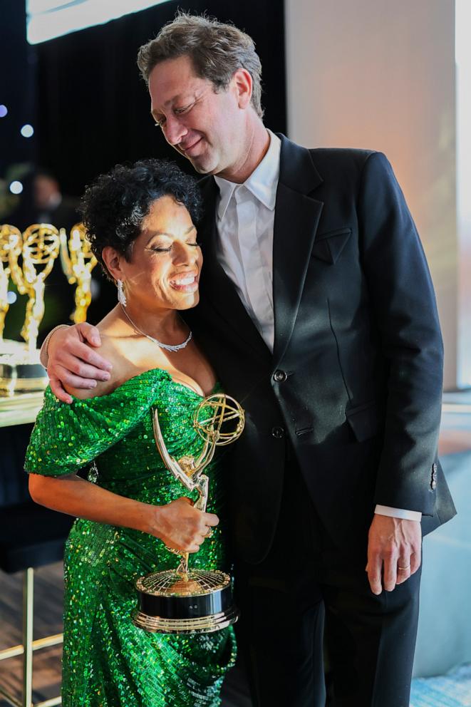 PHOTO: Liza Colon-Zayas and Ebon Moss-Bachrach pick up their official Emmy statuette for outstanding supporting actress and actor in a comedy series for "The Bear" at the 76th Emmy Awards Trophy Table, Sept. 15, 2024, in Los Angeles.