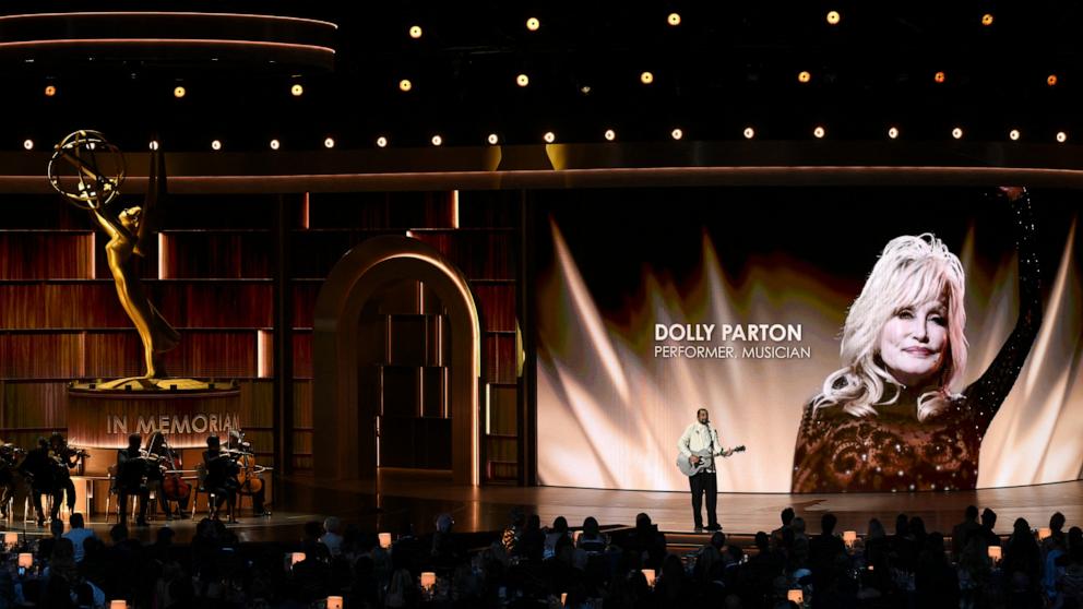 PHOTO: A picture of the late singer-songwriter Dolly Parton is projected on screen as singer Noah Kahan performs during the 78th Primetime Emmy Awards, in Los Angeles, September 14, 2026.