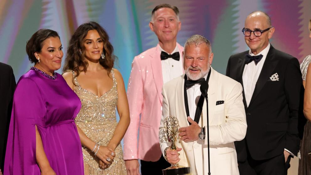 PHOTO: R. Scott Gemmill and cast/crew accept the Outstanding Drama Series Award for "The Pitt" onstage during the 78th Primetime Emmy Awards, September 14, 2026 in Los Angeles.