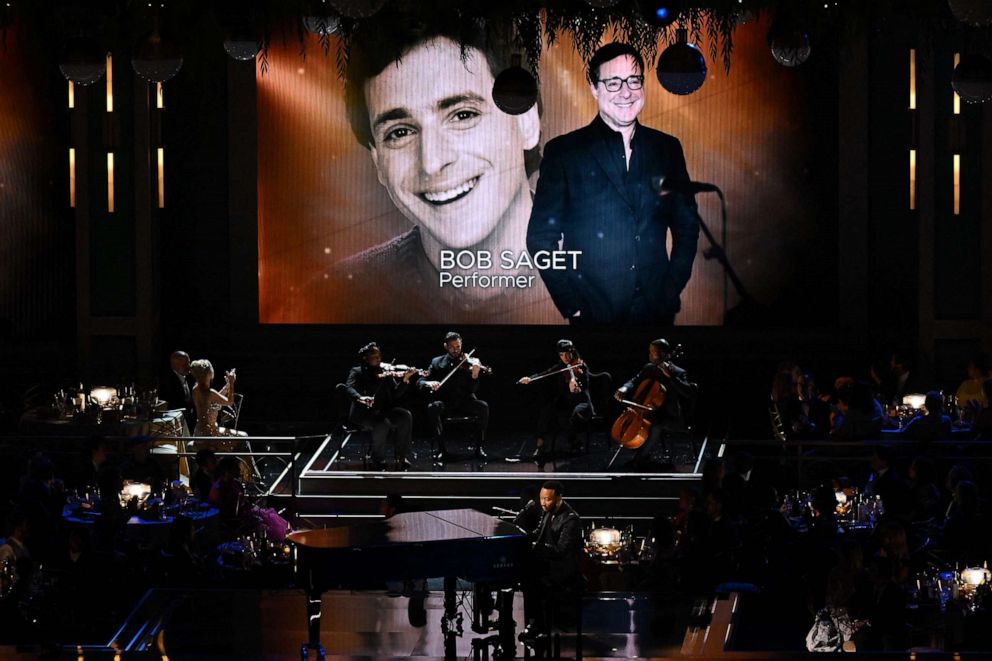 PHOTO: Late actor Bob Saget is seen onscreen during an In Memoriam segment performed by John Legend onstage during the 74th Emmy Awards at the Microsoft Theater in Los Angeles, on Sept. 12, 2022.