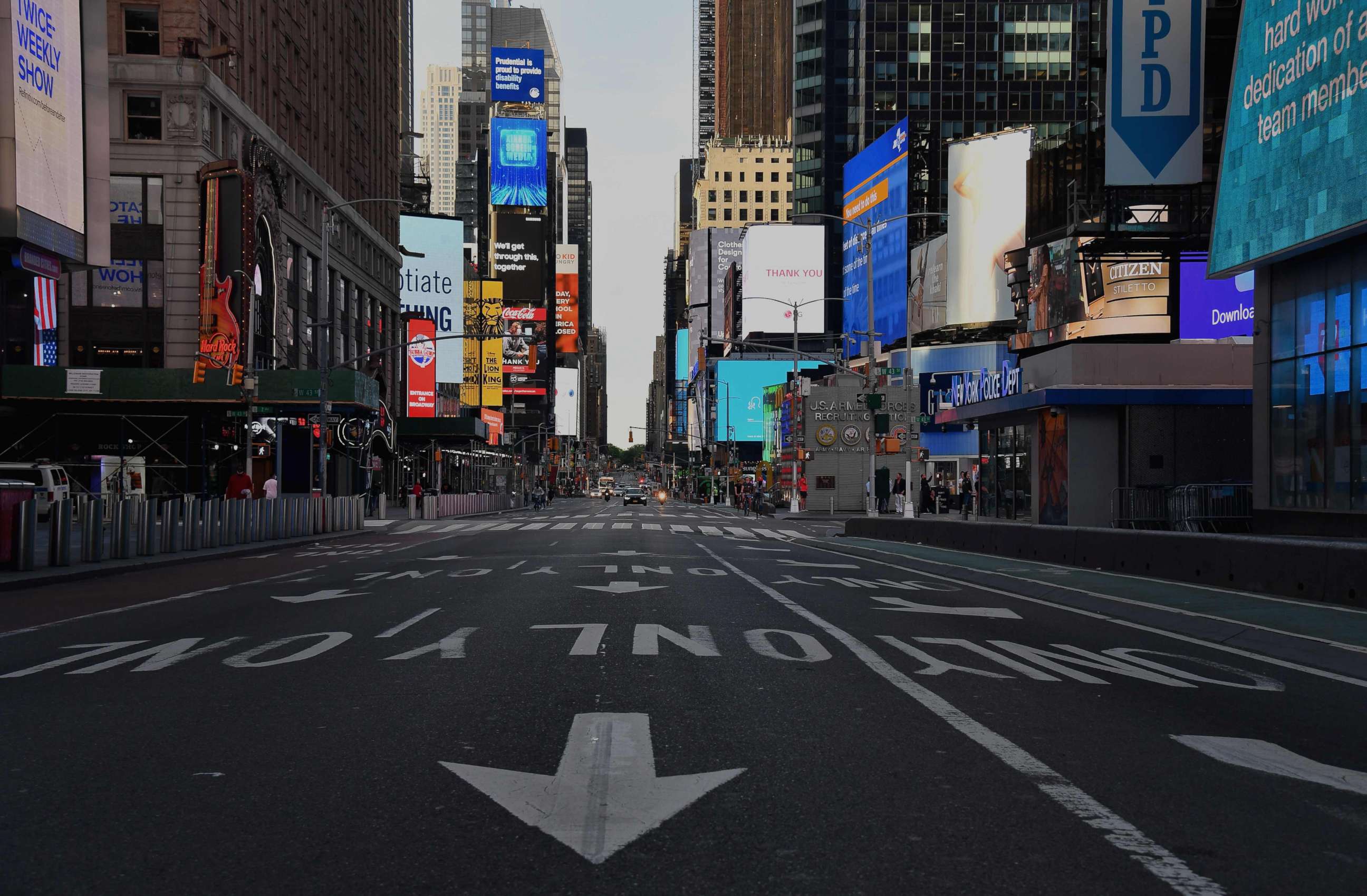 PHOTO: A car approaches on a nearly empty street near Times Square on May 27, 2020 in New York City.