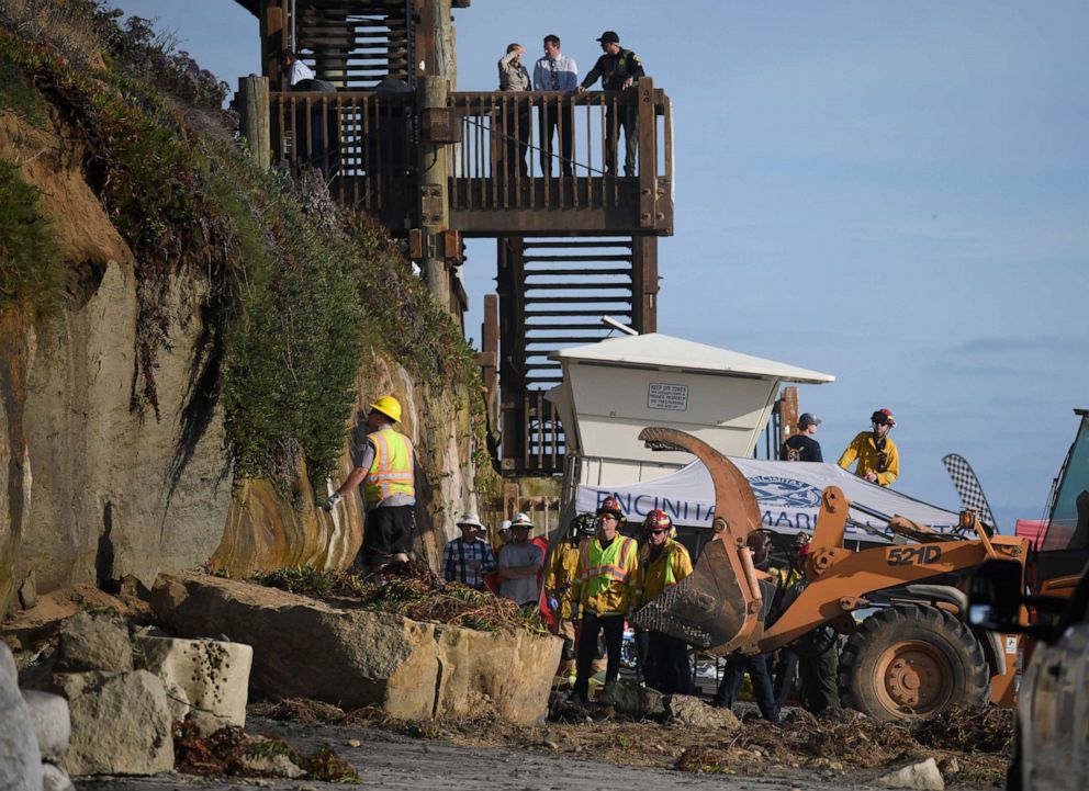 PHOTO: Search and rescue personnel work at the site of a cliff collapse at a popular beach Friday, Aug. 2, 2019, in Encinitas, Calif.