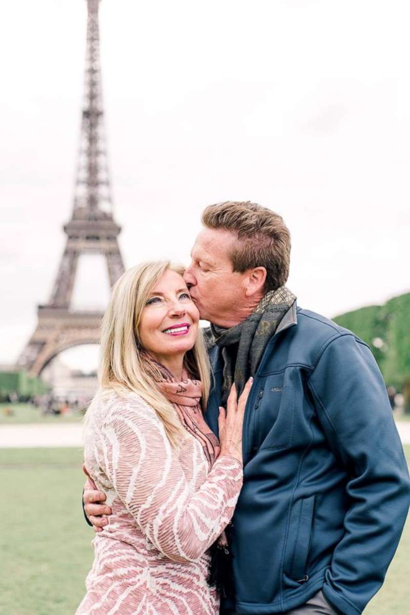 PHOTO: Photographer Emily Curd searching for couple engaged at Eiffel Tower.
