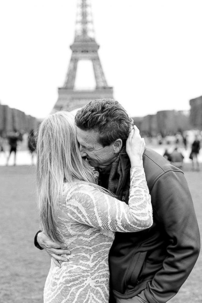 PHOTO: Photographer Emily Curd searching for couple engaged at Eiffel Tower.