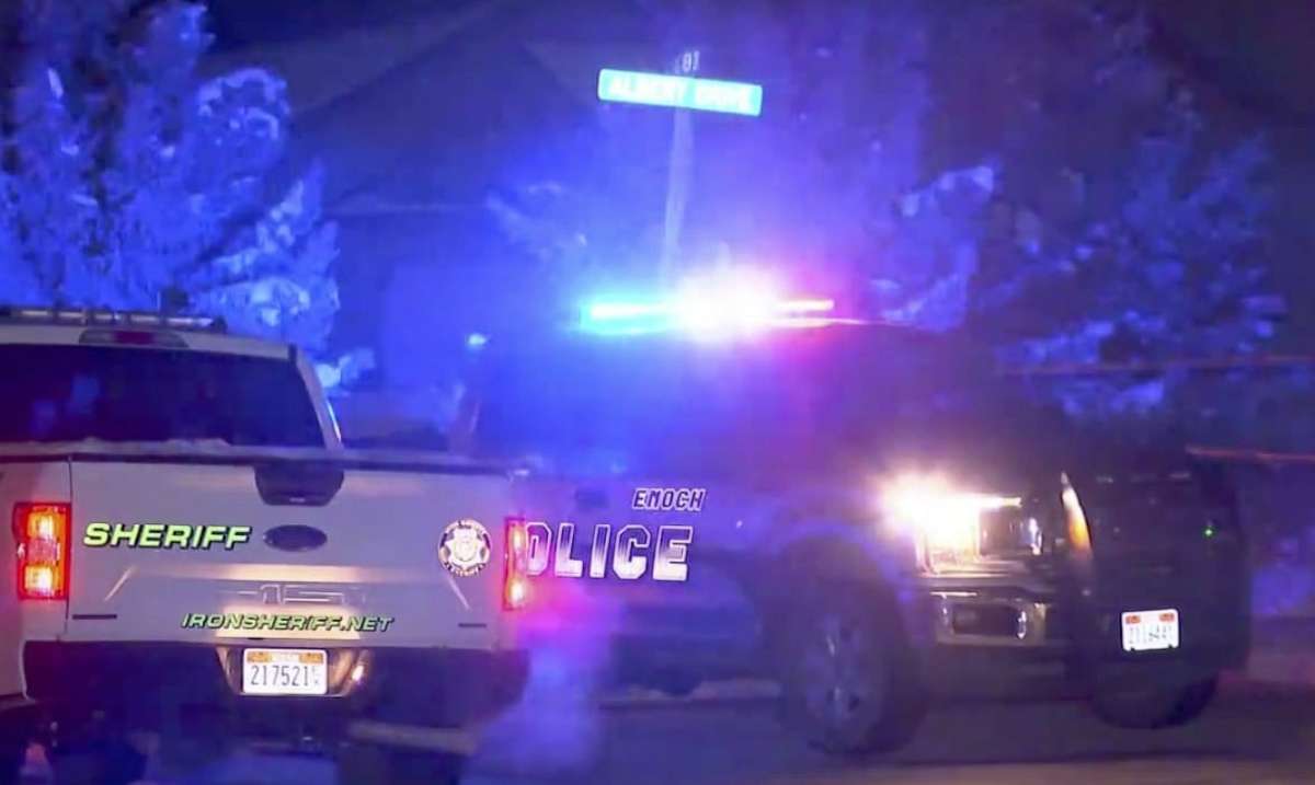 PHOTO: Police vehicles sit near an Enoch City, Utah, home were police say they found eight bodies on Wednesday, Jan. 4, 2023.