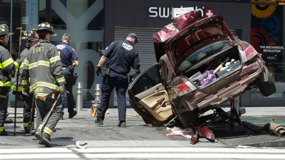 Woman killed, 22 injured after car plows into pedestrians in Times ...