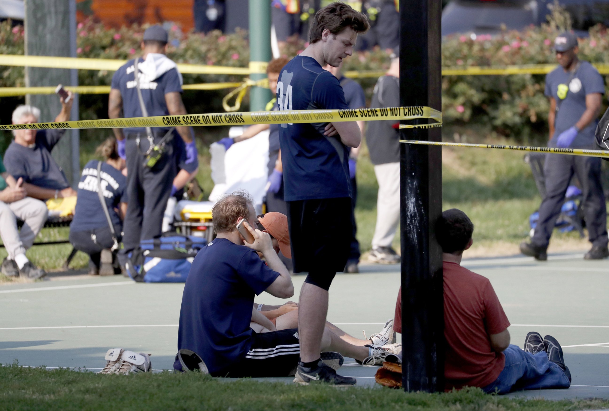 PHOTO: People gather near the scene of a shooting at the Republican Congressional baseball team  practice in Alexandria, Va, June 14, 2017. 