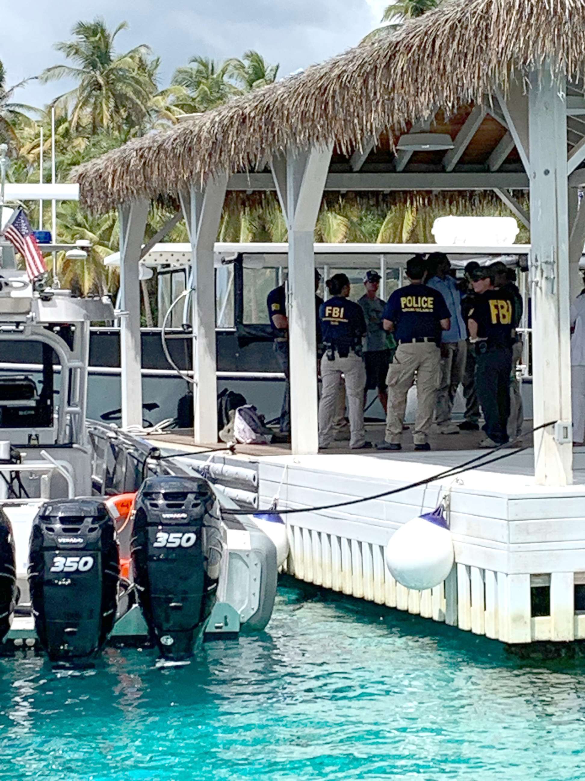 PHOTO: Federal agents, including FBI and CBP, at the dock and on the grounds of Little Saint James, Jeffrey Epstein's island home in the US Virgin Islands, Aug. 12, 2019.