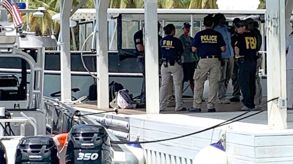 PHOTO: Federal agents, including FBI and CBP, at the dock and on the grounds of Little Saint James, Jeffrey Epstein's island home in the US Virgin Islands, Aug. 12, 2019.