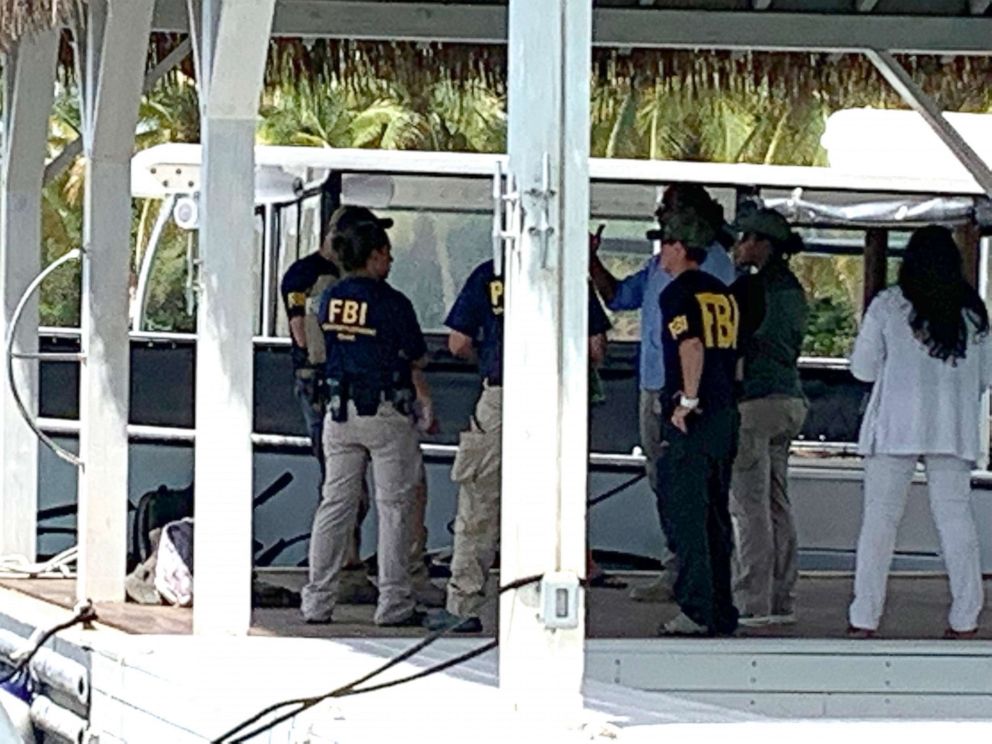 PHOTO: Federal agents, including FBI and CBP, at the dock and on the grounds of Little Saint James, Jeffrey Epstein's island home in the US Virgin Islands, Aug. 12, 2019.