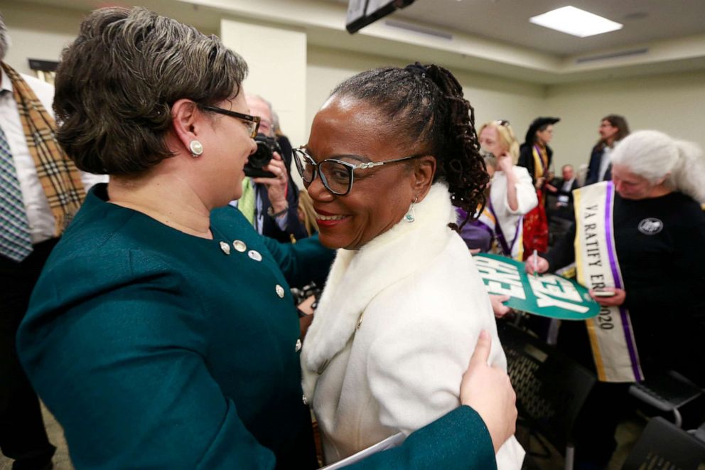 PHOTO:Sponsors of the Equal Rights Amendment, State Se. Jennifer McClellan, D-Richmond, left, and Sen. Mamie Locke, D-Hampton, right, hug after the Senate Privileges and Elections committee vote in Richmond, Va., Jan. 9, 2020. 