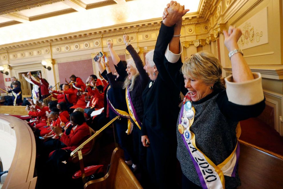 PHOTO: Equal Rights Amendment supporter Donna Granski, right, from Midlothian Va., cheers the passage of the House ERA Resolution in the Senate chamber at the Capitol in Richmond, Va., Jan. 27, 2020. The resolution passed 27-12.