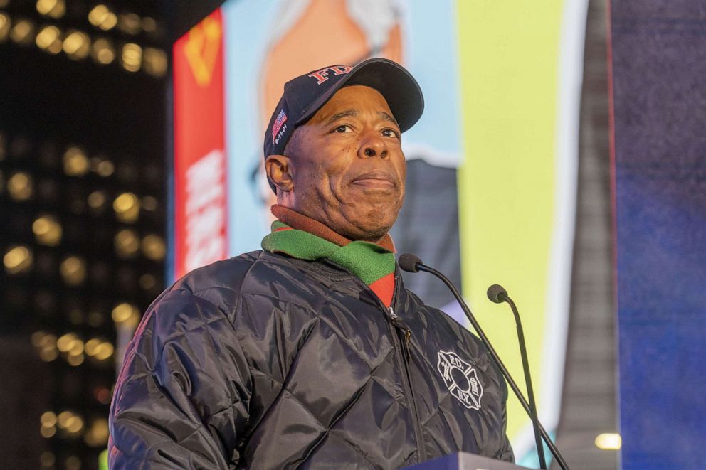 PHOTO: New York City Mayor Eric Adams speaks at a candlelight vigil in Times Square for Michelle Alyssa Go, who was killed at the Times Square subway station last Saturday in New York, on Jan. 18 2022.