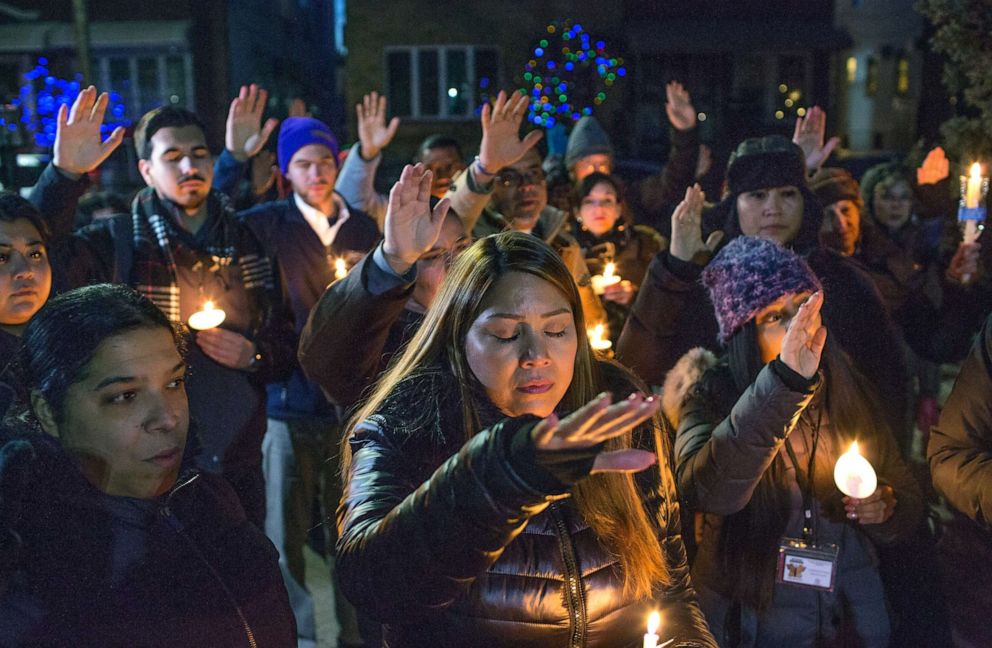 PHOTO: Carmen Cruz leads a candlelight vigil to her home for her son, Eric Diaz-Cruz, who was shot in the face by an ICE agent after intervening in the arrest for deportation of his mother's boyfriend, Feb. 16, 2020, in Brooklyn, New York.