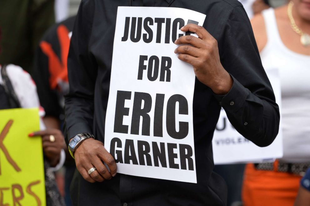 PHOTO: Demonstrators rally against police brutality in memory of Eric Garner on Aug. 23, 2014 in Staten Island, N.Y. 