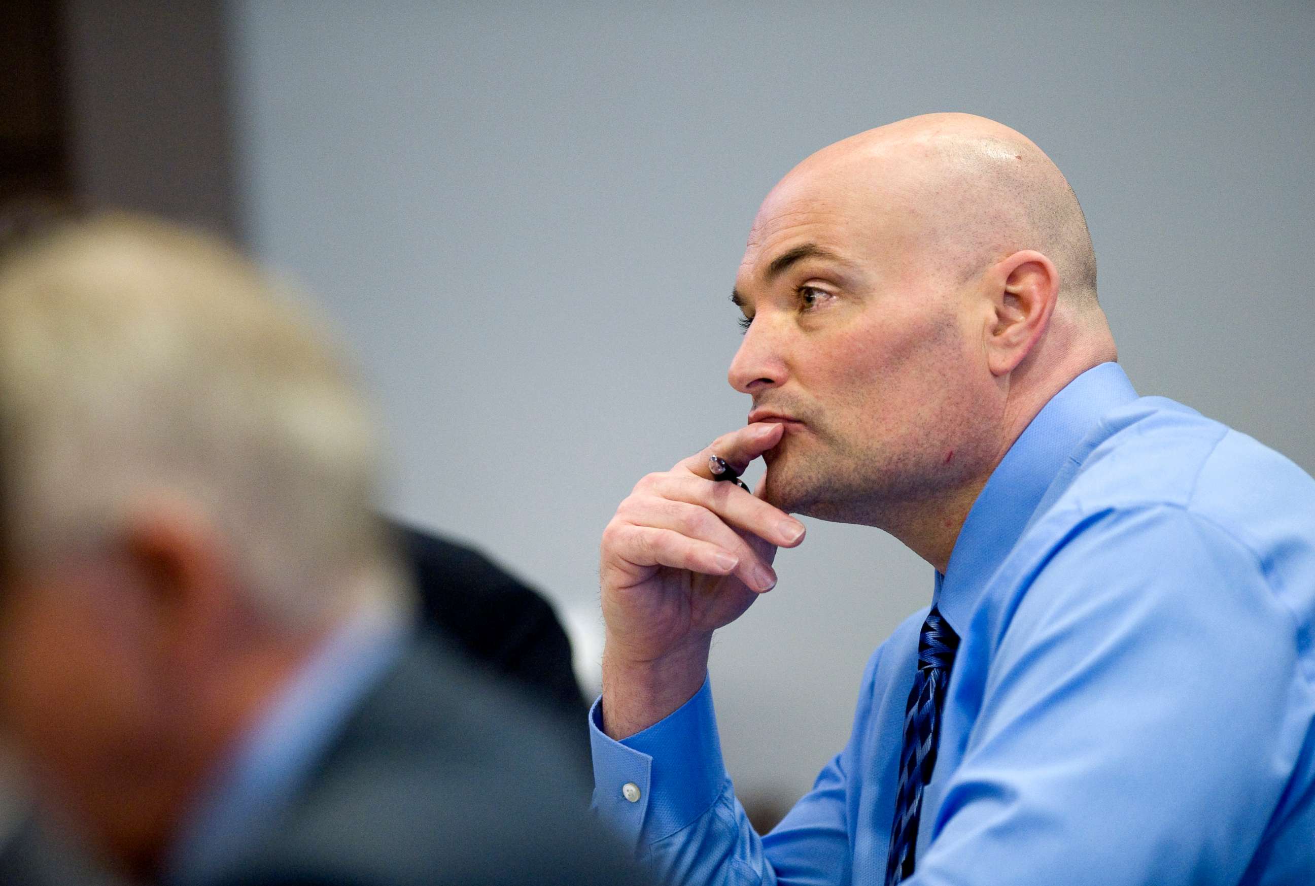 PHOTO: Defendant Eric Naposki listens as Deputy District Attorney Matt Murphy offers his closing statements during Naposki's murder trial in Santa Ana, Calif., July 12, 2011.