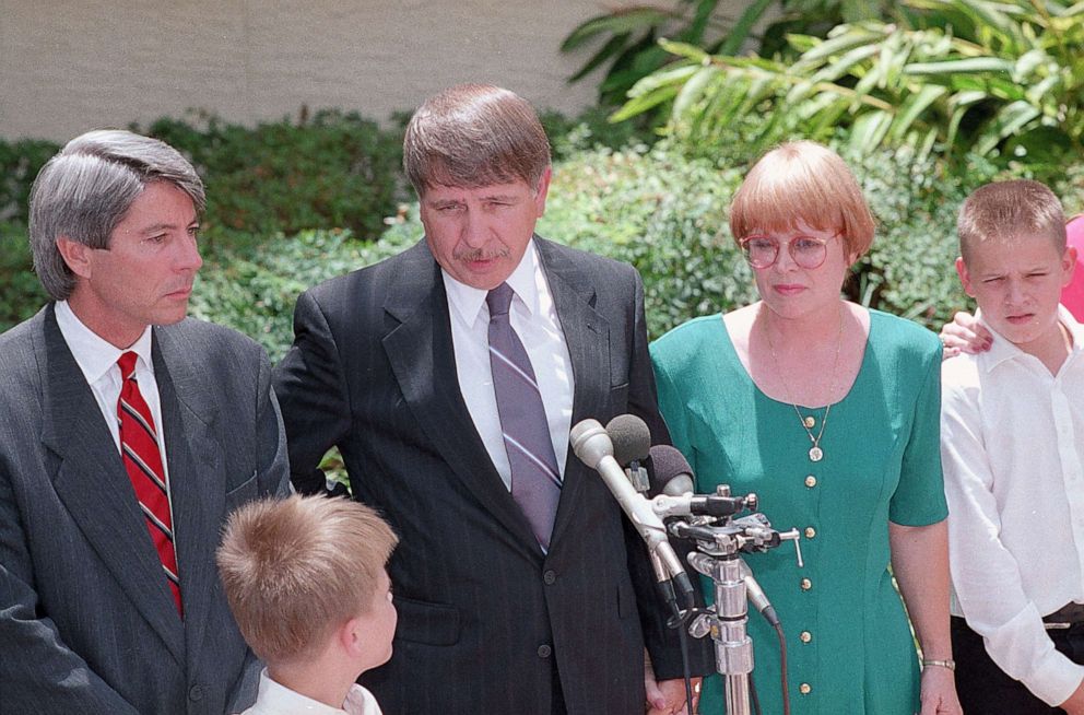 PHOTO: Ernest and Regina Twigg, accompanied by their lawyer John Blakely, left, are seen talking to the media outside the courthouse in Sarasota, Fla., Aug. 10, 1993.