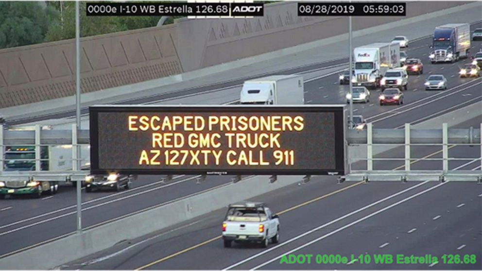 PHOTO: This photo from an Arizona Department of Transportation remote camera shows a digital sign over Interstate 10 in the Phoenix metropolitan area that seeks the public's help in locating escaped murder suspects,Wednesday, Aug. 28, 2019.