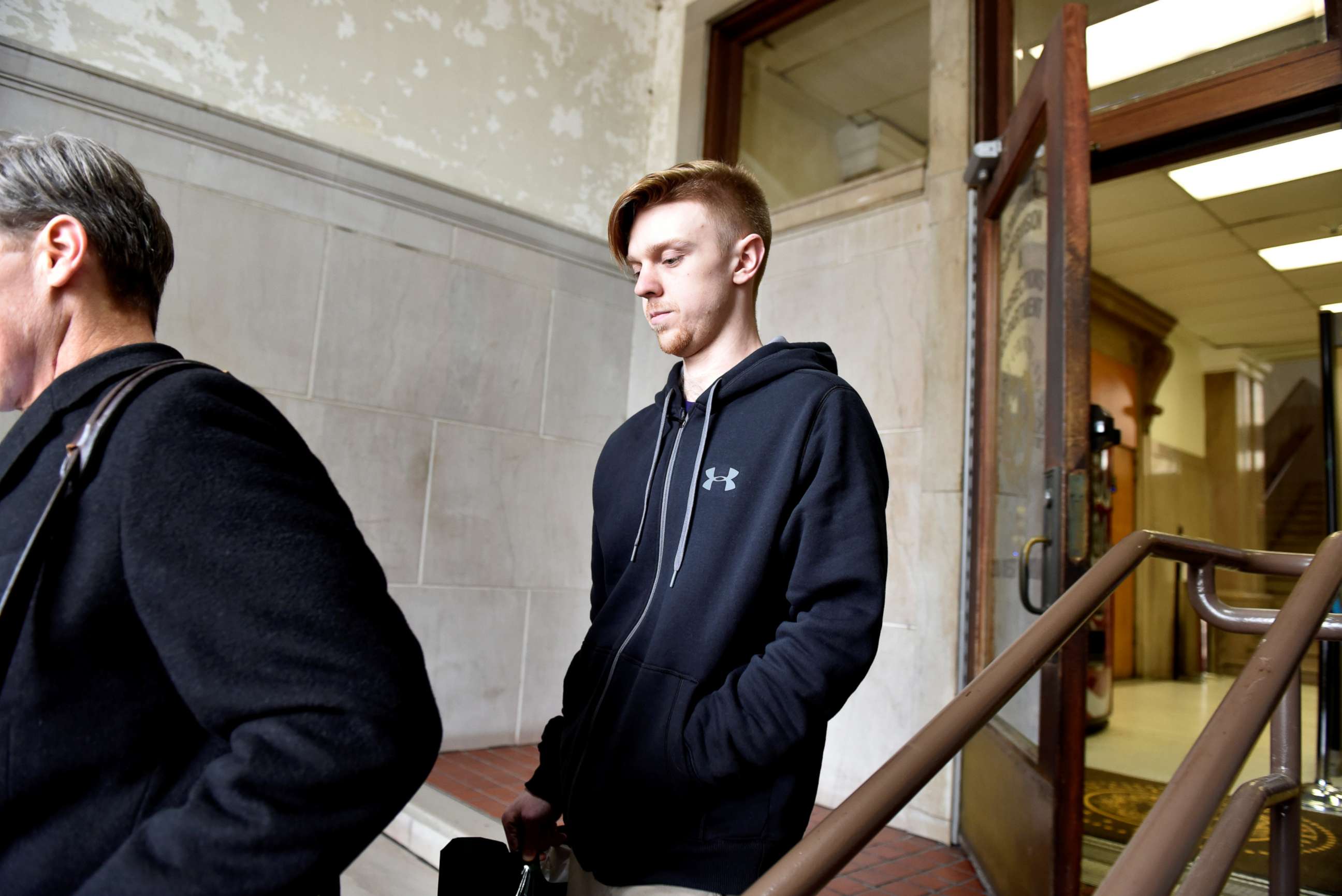 PHOTO: Ethan Couch follows his lawyer out of the Tarrant County Department of Corrections after being released from the Tarrant County Jail in Fort Worth, Texas, April 2, 2018.  