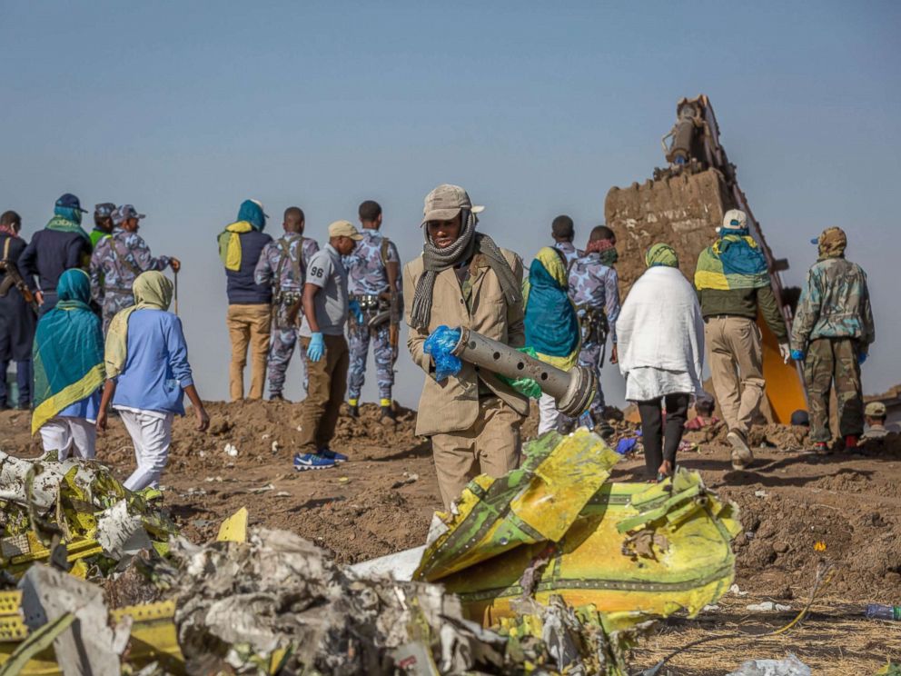 PHOTO: Workers gather at the scene of an Ethiopian Airlines flight crash near Bishoftu, south of Addis Ababa, Ethiopia, March 11, 2019.