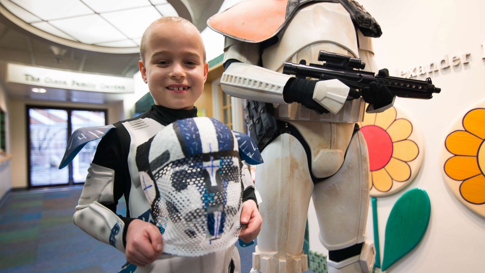 PHOTO: Evan, 8, holds his proton beam mask that has been painted to resemble a Stormtrooper helmet from the "Star Wars" movies by an employee of St. Louis Children's Hospital.