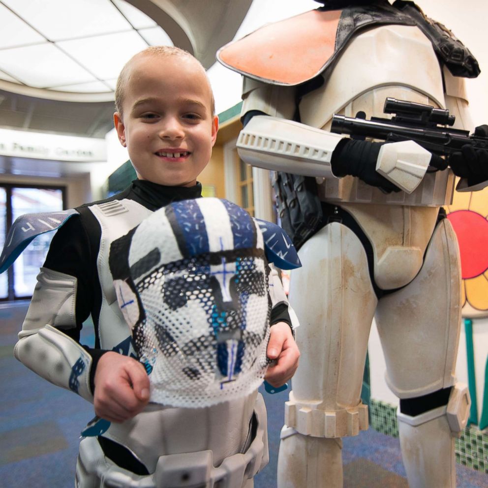 Eight-year-old Evan has to wear a mask as he undergoes proton beam therapy to fight his brain tumor - so the staff at St. Louis Children's Hospital surprised him with his very own Stormtroopers helmet.