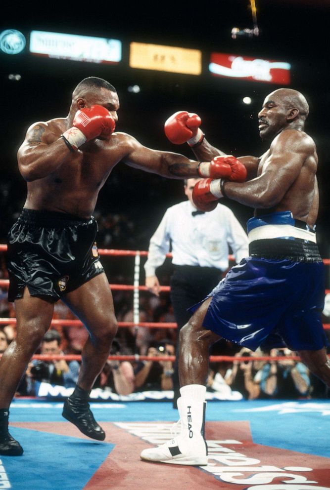 PHOTO: Evander Holyfield and Mike Tyson fight for the WBA Heavyweight tittle at the MGM Grand Garden on Nov. 9, 1996, in Las Vegas.