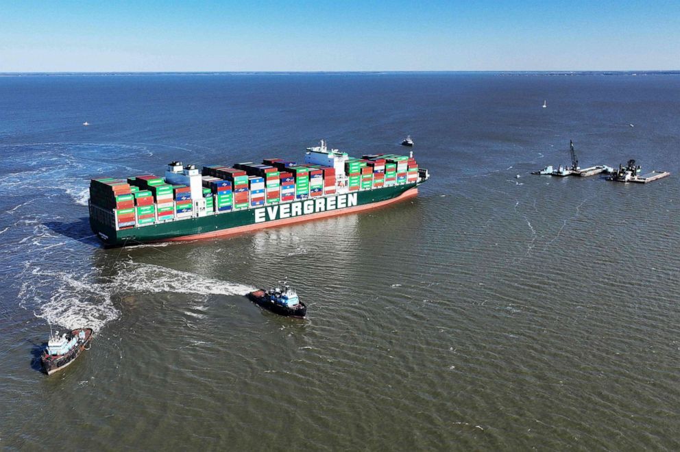 PHOTO: Tugboats pull on the Ever Forward container ship in Pasadena, Maryland, March 29, 2022, trying to free the cargo ship as it sits in the Chesapeake Bay after it ran aground near Baltimore.