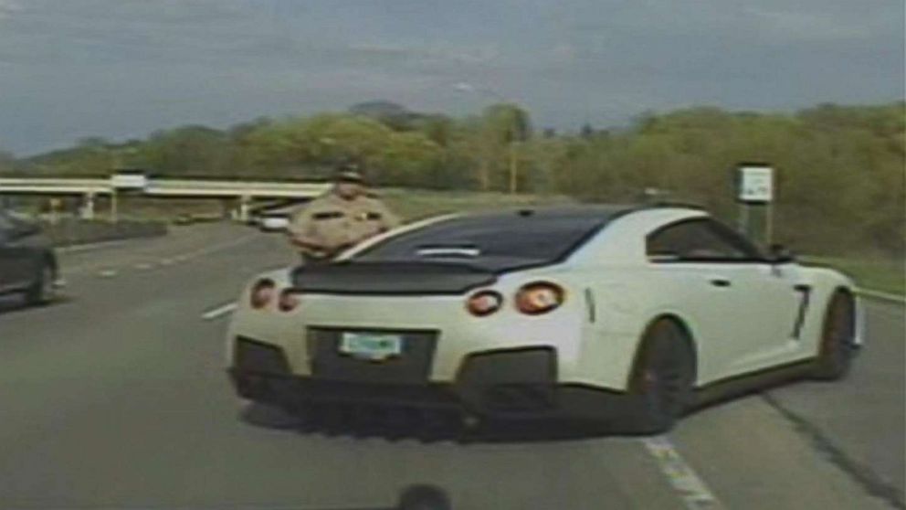 PHOTO: Dashcam footage caught a line of exotic cars speeding down a highway.