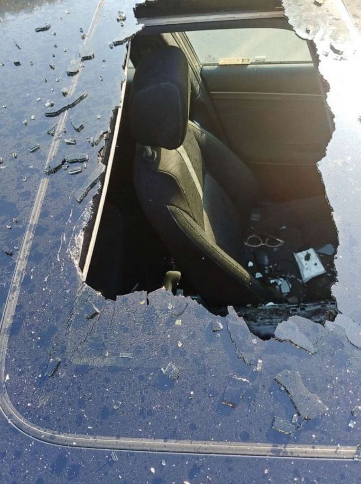 PHOTO: damage to a car roof from an exploding dry shampoo can