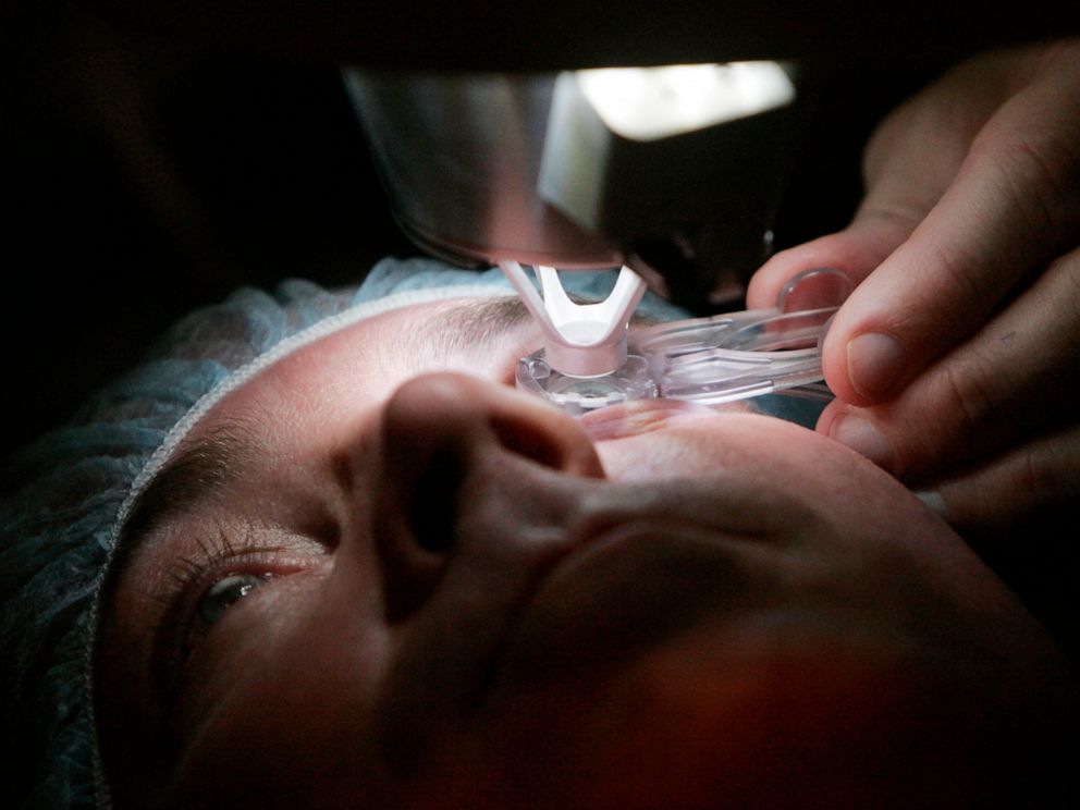 PHOTO: In this Nov. 1, 2005 file photo, a doctor prepares a patient for eye surgery in Chicago.