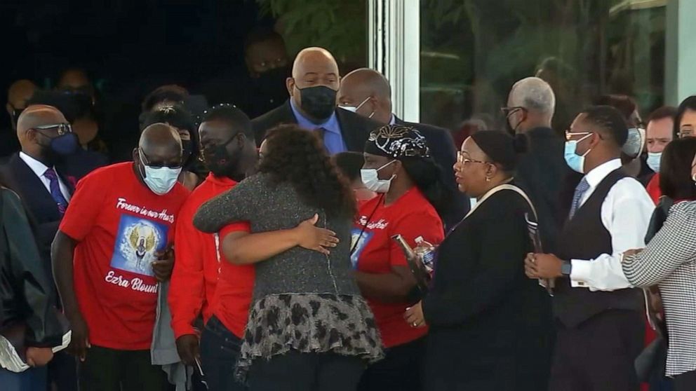 PHOTO: Mourners comfort one another at the funeral of nine-year-old Ezra Blount, who died after sustaining injuries during a crowd surge at the Travis Scott Astroworld concert, in Dallas, Nov. 23, 2021.