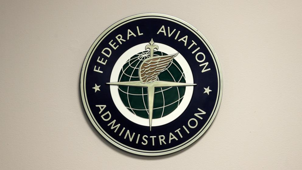PHOTO: A Federal Aviation Administration sign hangs in the tower at John F. Kennedy International Airport in New York, Mar. 16, 2017. 