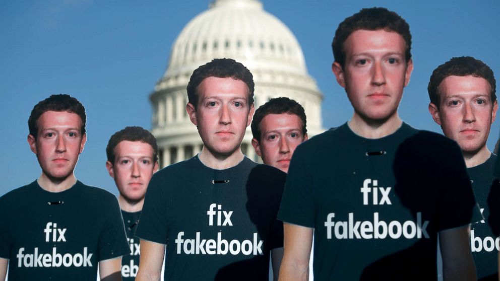 Cardboard cutouts of Facebook founder and CEO Mark Zuckerberg stand outside the U.S. Capitol in Washington, April 10, 2018.