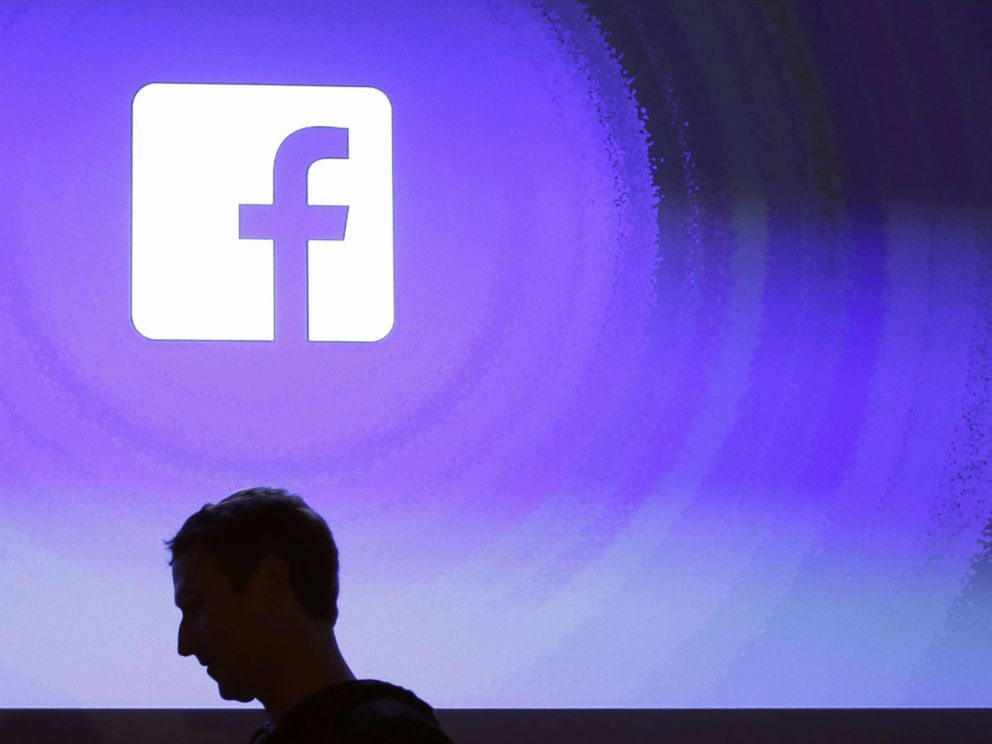 PHOTO: Facebook CEO Mark Zuckerberg walks at the companys headquarters in Menlo Park, Calif., in this April 3, 2013 file photo.