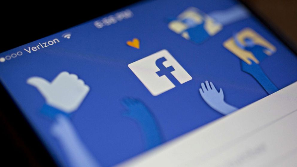 The Facebook application is displayed on an Apple iPhone in Washington, D.C., March 21, 2018.