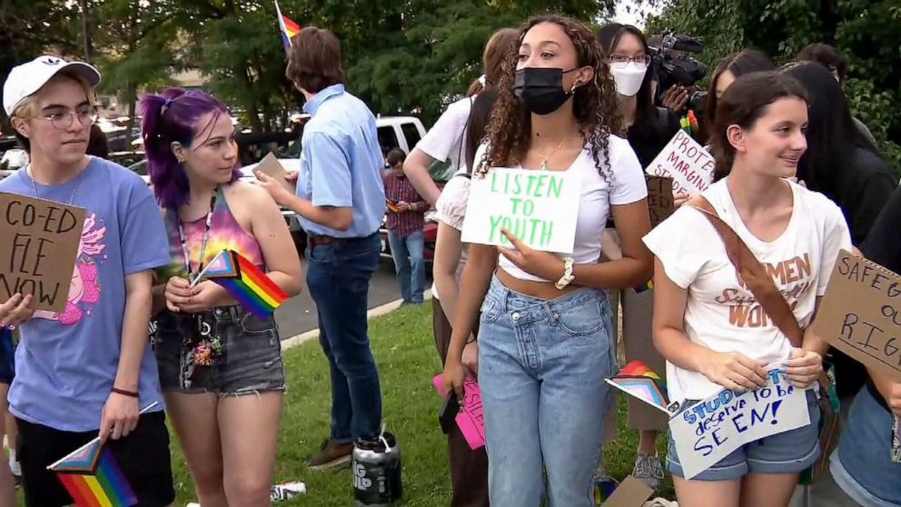 PHOTO: Students gather outside of a Fairfax County School Board meeting to advocate for co-ed sex education classes at school.