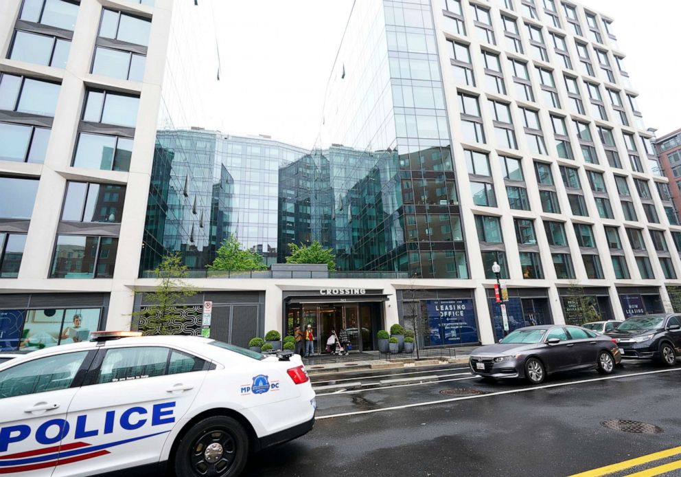 PHOTO: A Metropolitan Police patrol car is parked in front of an apartment building in Washington, April 7, 2022. Federal prosecutors charged two men with posing as federal agents, giving free apartments and other gifts to U.S. Secret Service agents.