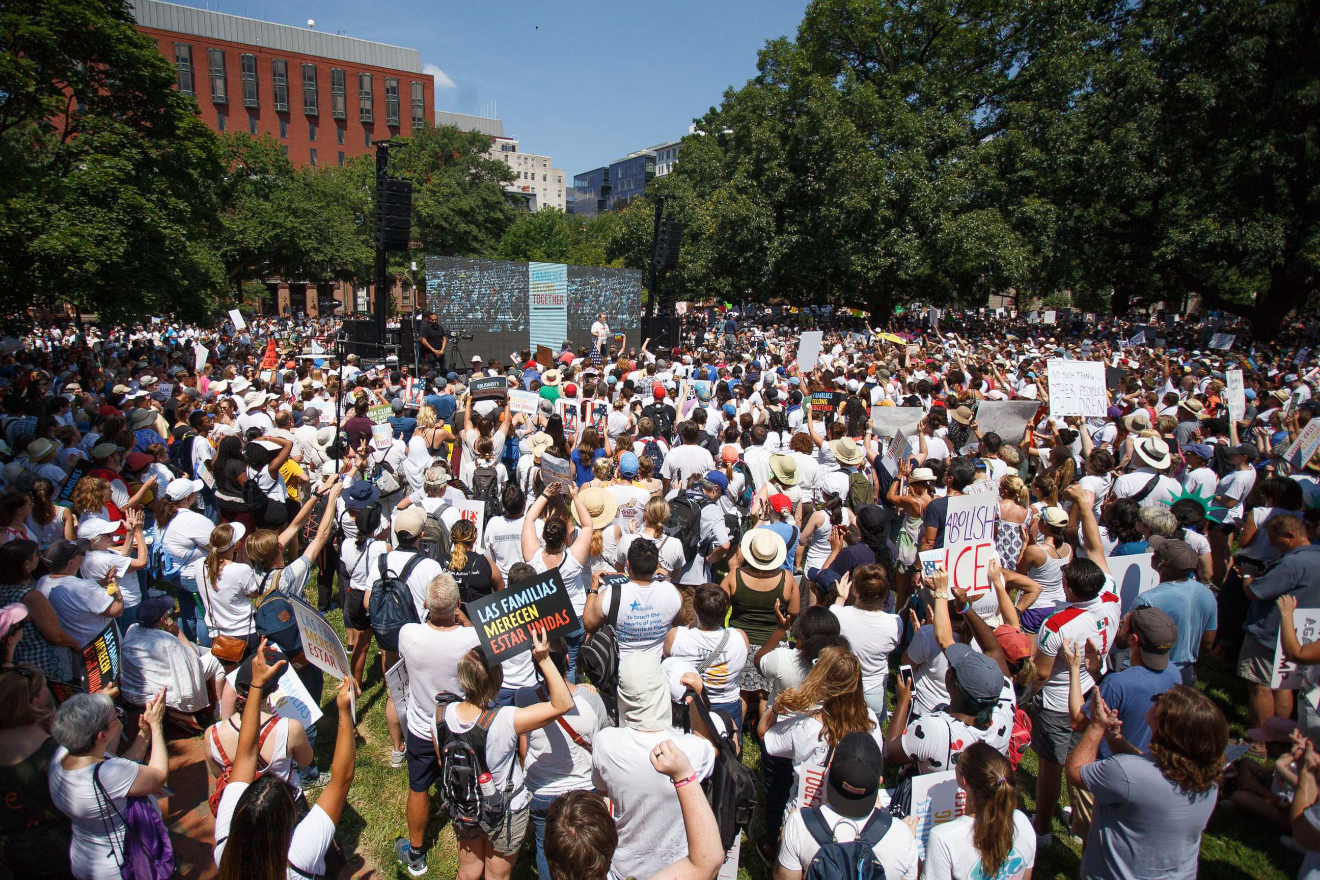 PHOTO: Protesters gather in Lafayette Park, across from the White House, for the Families Belong Together March, Washington DC, June 30, 2018.