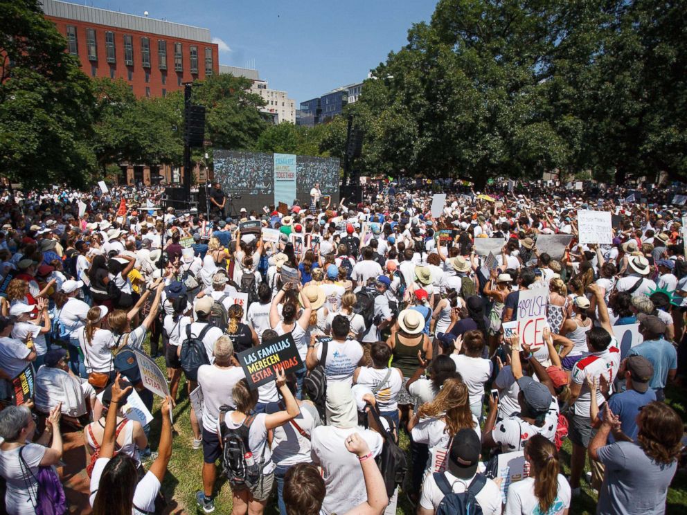 PHOTO: Protesters gather in Lafayette Park, across from the White House, for the Families Belong Together March, Washington DC, June 30, 2018.