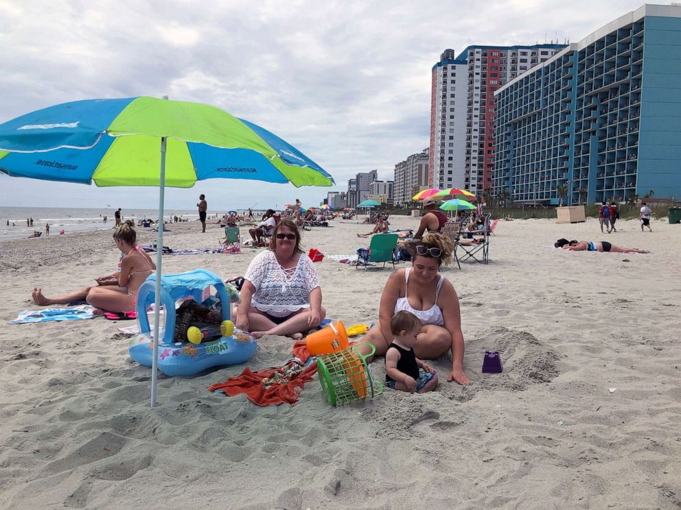 PHOTO: A family enjoys a day at the beach in Myrtle Beach, South Carolina, on June 18, 2020.