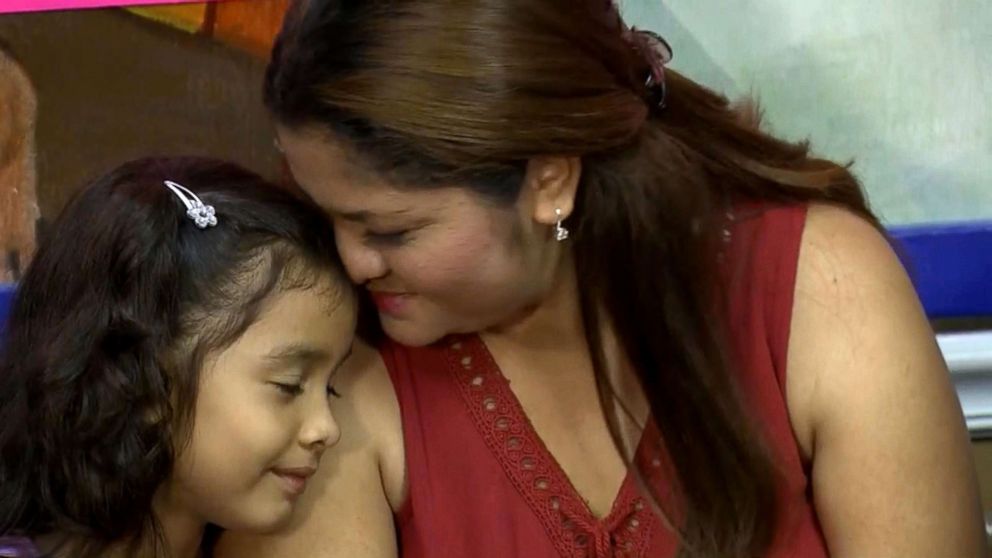 PHOTO: Allison Ximena, 6, and her mother Cindy Madrid participate in a press conference after they were reunited in Houston, Texas, July 13, 2018.