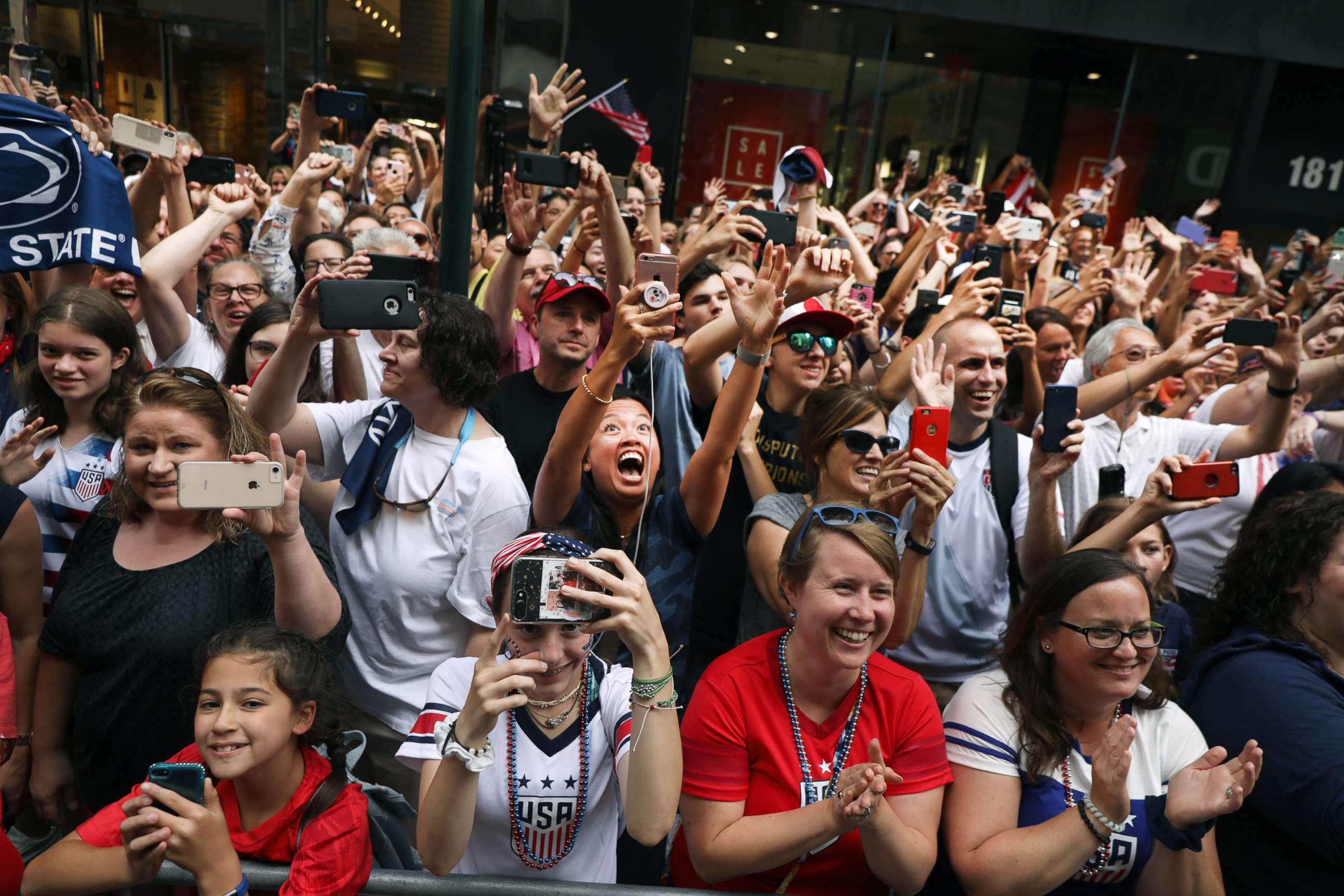 PHOTO: Fans cheer as members of the U.S. Women's  National Soccer Team travel down the "Canyon of Heroes" in a ticker tape parade, July 10, 2019, in New York City.