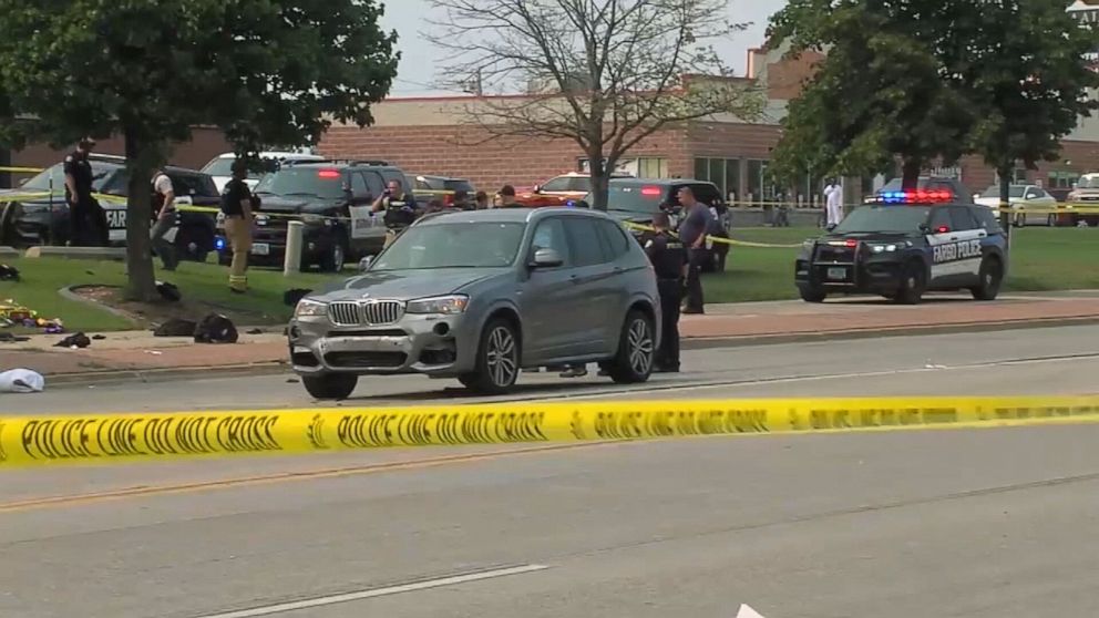 PHOTO: First responders on the scene after three police officers were shot and seriously wounded in Fargo, N.D., July 14, 2023.